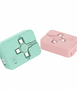 Two rectangular devices, one green and one pink, on a white background