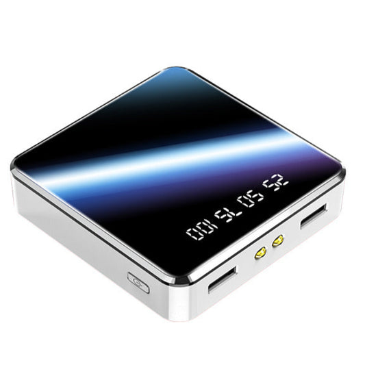 Portable electronic device with a reflective surface on a white background