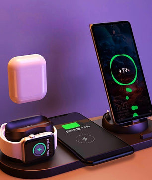Wireless charging station with smartphone, smartwatch, and airpods on a purple background
